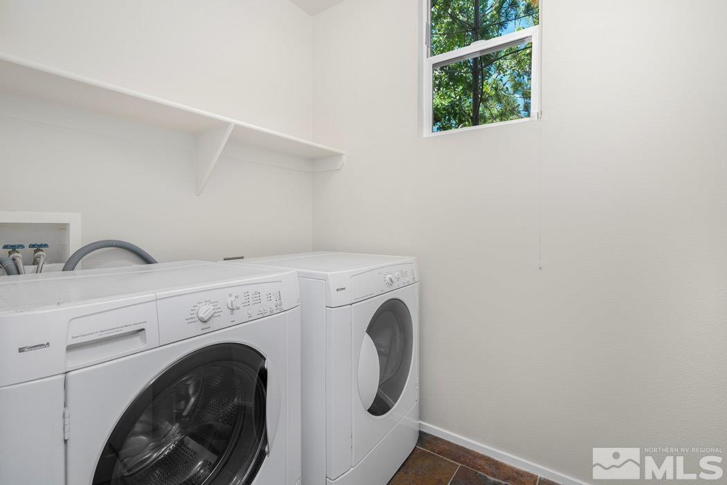 9646 Otter Way Reno, NV 89521 - Photo 23 of 25 a utility room with dryer and washer