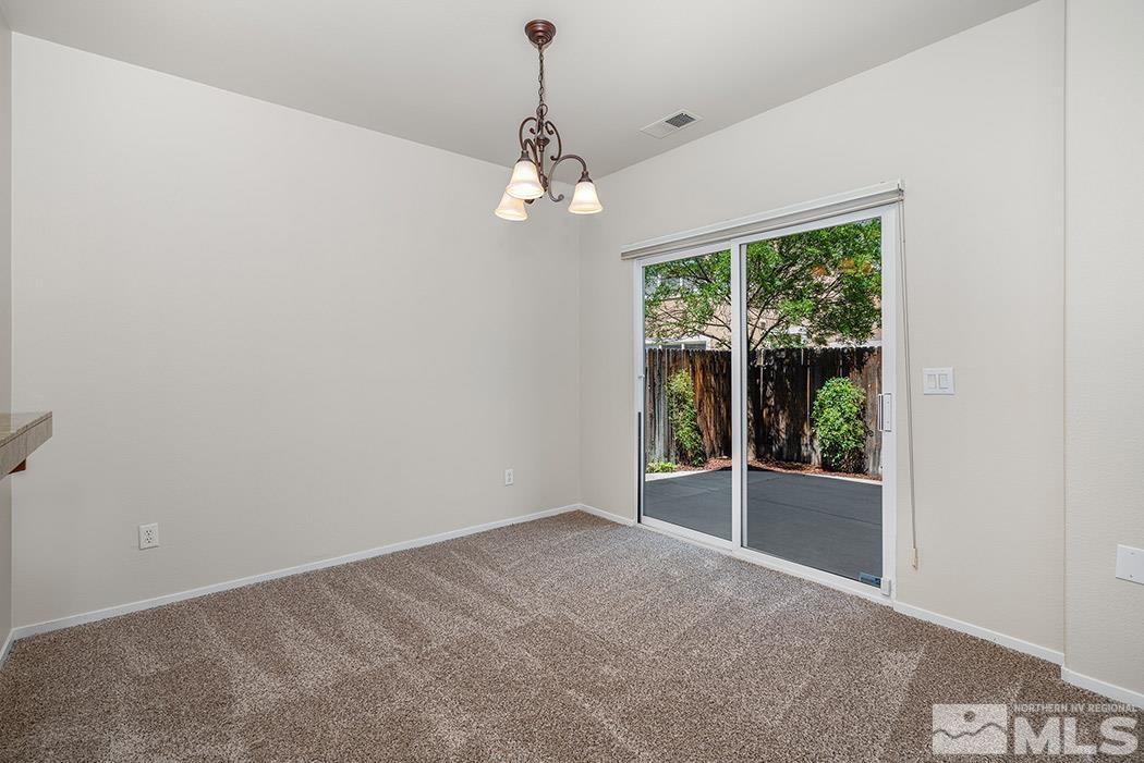 9646 Otter Way Reno, NV 89521 - Photo 8 of 25 a view of livingroom with window