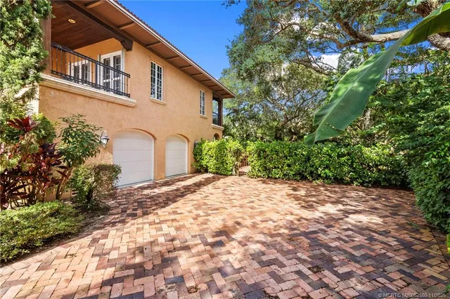 a backyard of a house with lots of green space