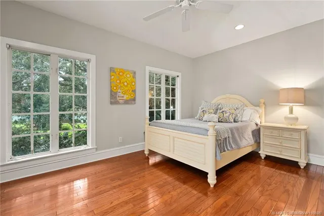 a room with a bed and a window