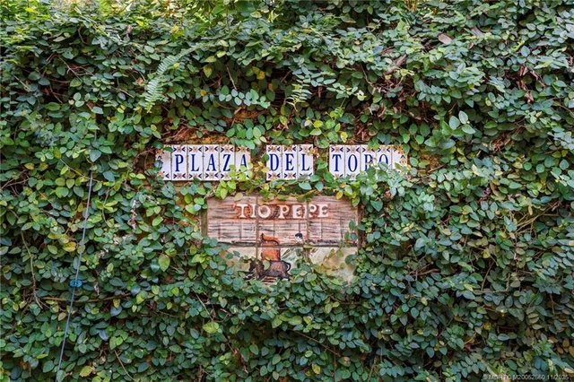 a sign on the side of a road