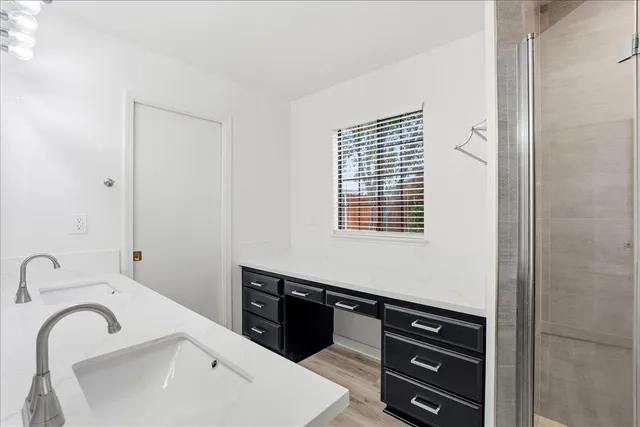 a bathroom with a sink and a bathtub