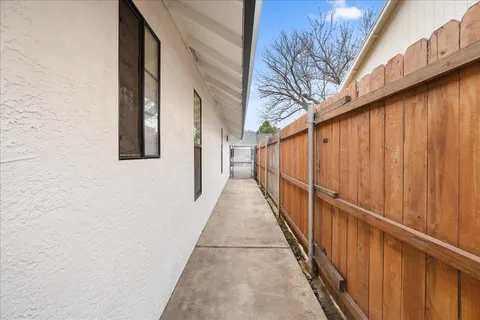 a view of a house with wooden floor and stairs