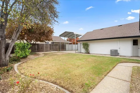 a front view of house with yard