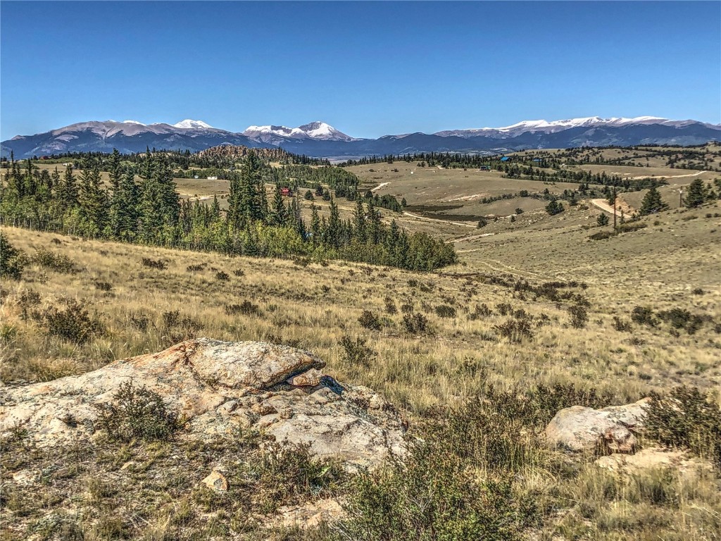 669 Travois Road Como, CO 80456 - Photo 6 of 17 a view of a lake with sunset