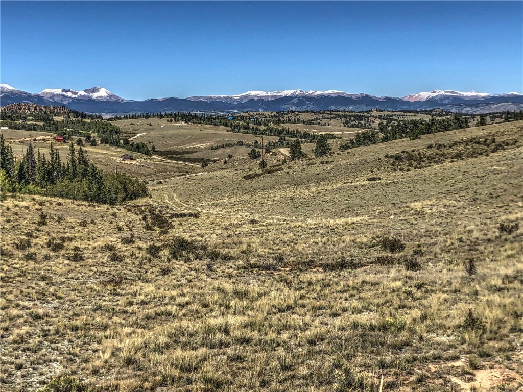 669 Travois Road Como, CO 80456 - Photo 8 of 17 a view of a lake with sunset