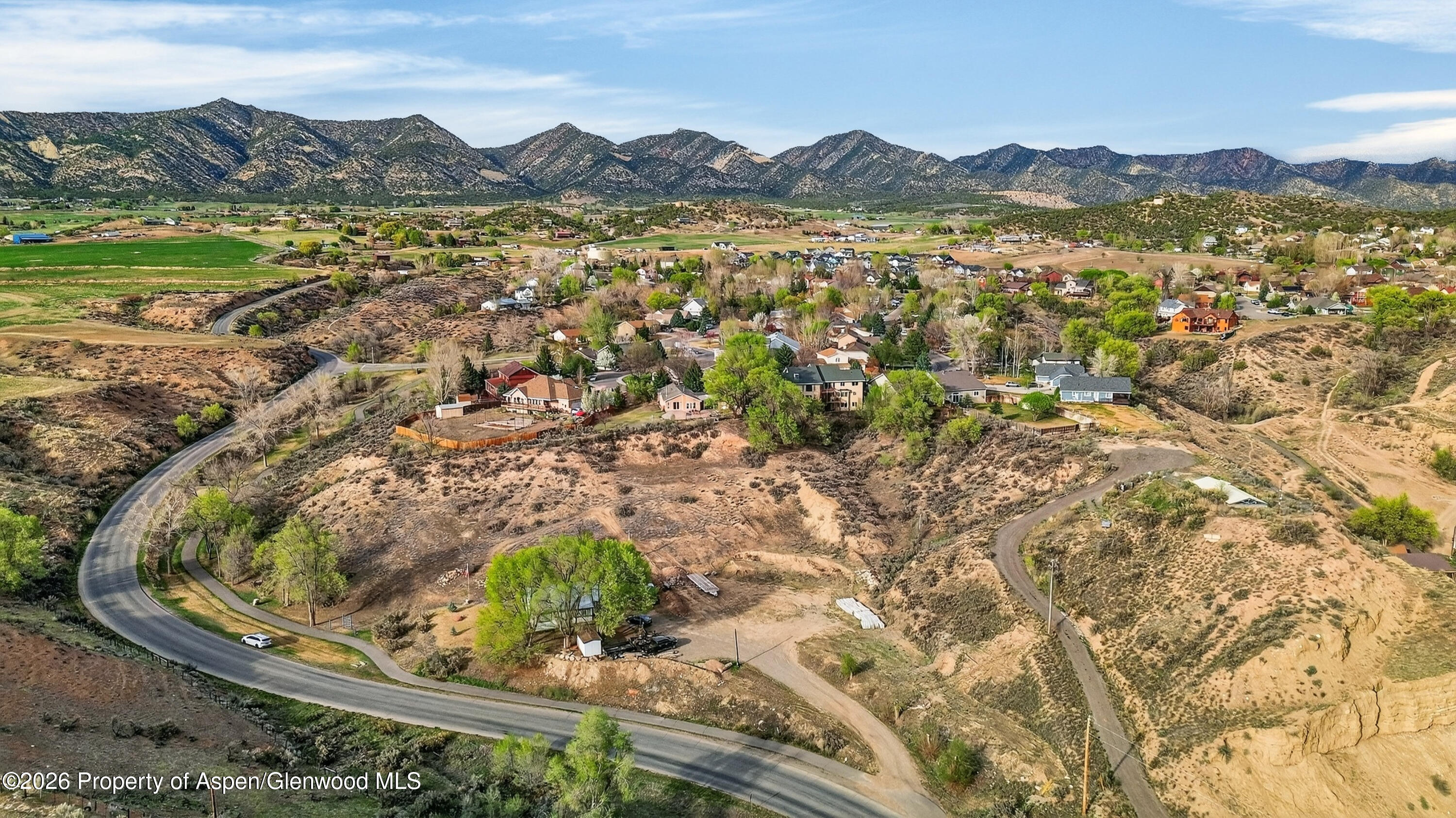 734 North 7th Street Silt, CO 81652 - Photo 7 of 10 a view of a city with mountains in the background