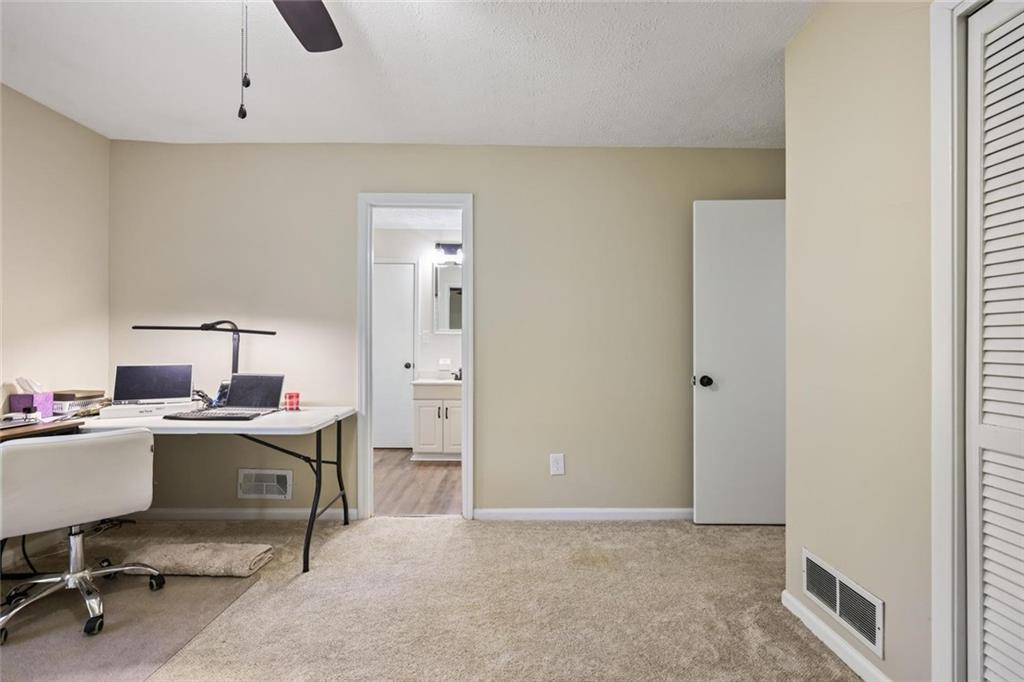 4505 Cochran Mill Road Fairburn, GA 30213 - Photo 26 of 36 a view of a workspace with furniture