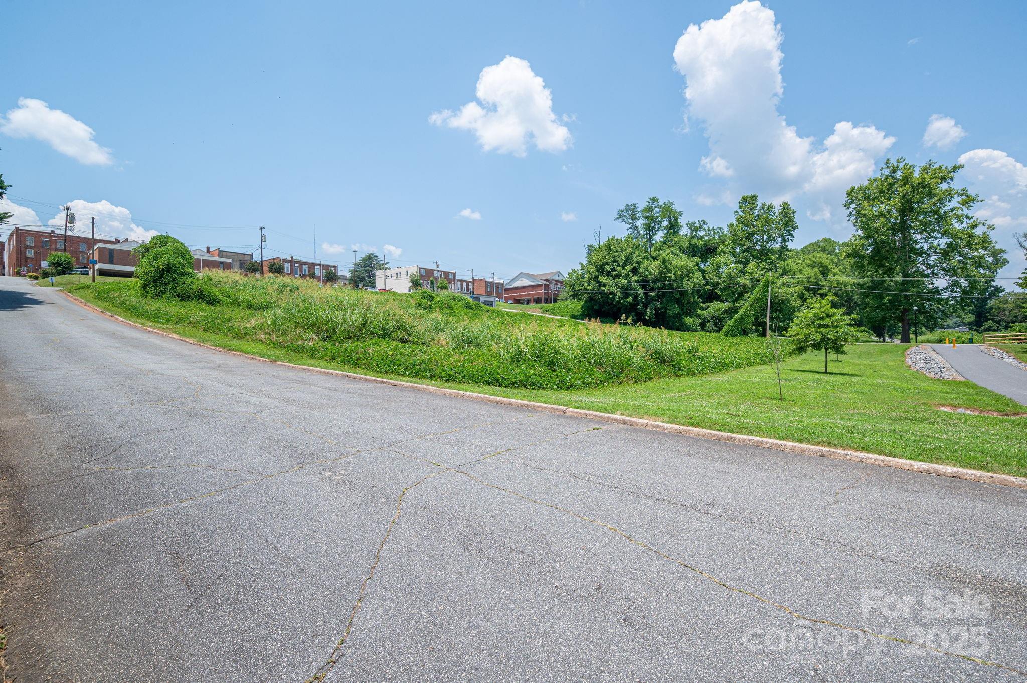 0 East 1st Street Rutherfordton, NC 28139 - Photo 11 of 24 a swimming pool with outdoor seating and garden