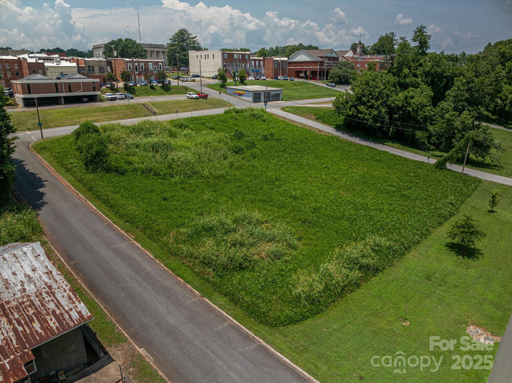 0 East 1st Street Rutherfordton, NC 28139 - Photo 3 of 24 a view of a city street with tall buildings