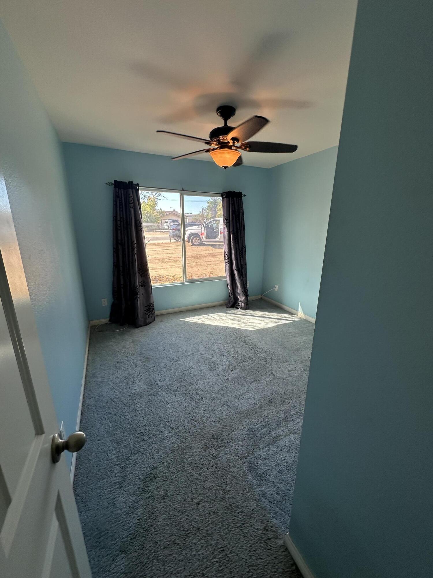 15786 El Centro Road Hesperia, CA 92345 - Photo 11 of 14 a view of empty room with windows
