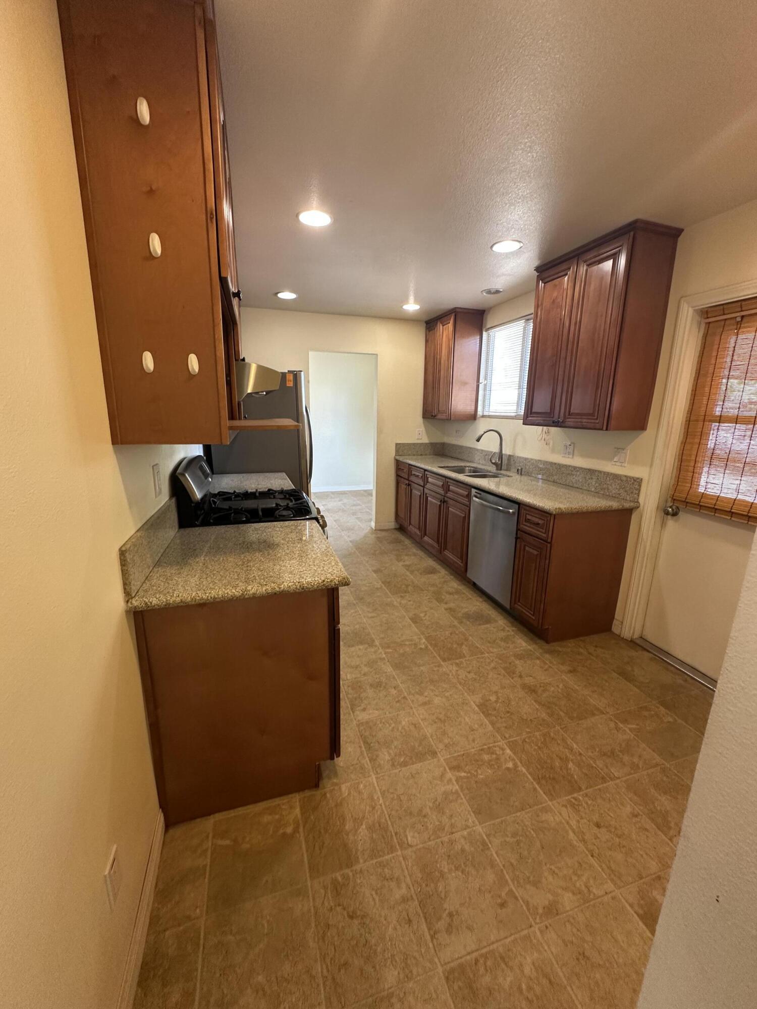 15786 El Centro Road Hesperia, CA 92345 - Photo 5 of 14 a room with a bed and furniture