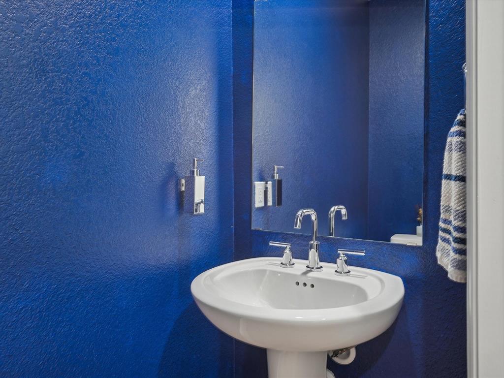 321 Fulton Street Oak Point, TX 75068 - Photo 22 of 36 a bathroom with a sink and a mirror