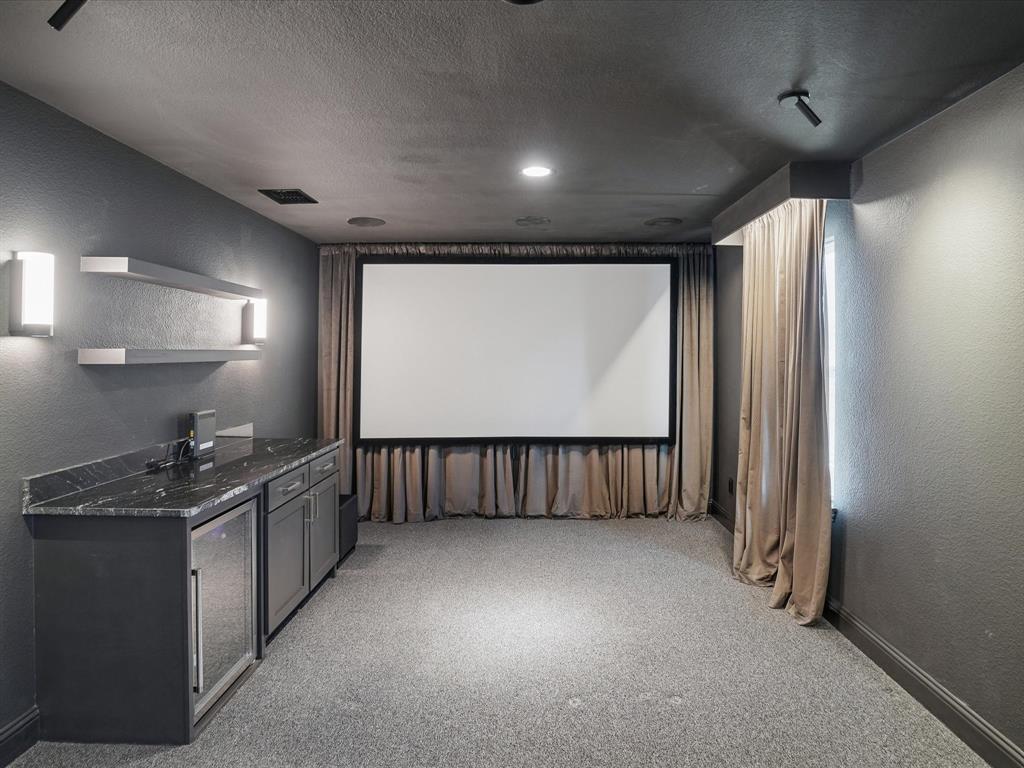 321 Fulton Street Oak Point, TX 75068 - Photo 28 of 36 a kitchen with stainless steel appliances granite countertop a refrigerator a sink and a stove