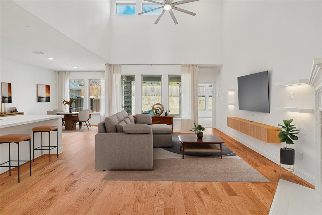 321 Fulton Street Oak Point, TX 75068 - Photo 3 of 36 a living room with furniture and a large window
