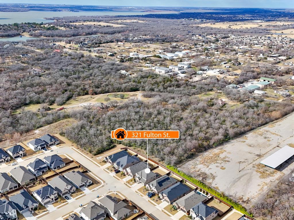 321 Fulton Street Oak Point, TX 75068 - Photo 36 of 36 an aerial view of residential houses with outdoor space