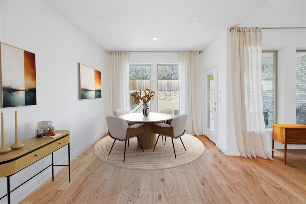 321 Fulton Street Oak Point, TX 75068 - Photo 4 of 36 a view of a dining room with furniture window and wooden floor