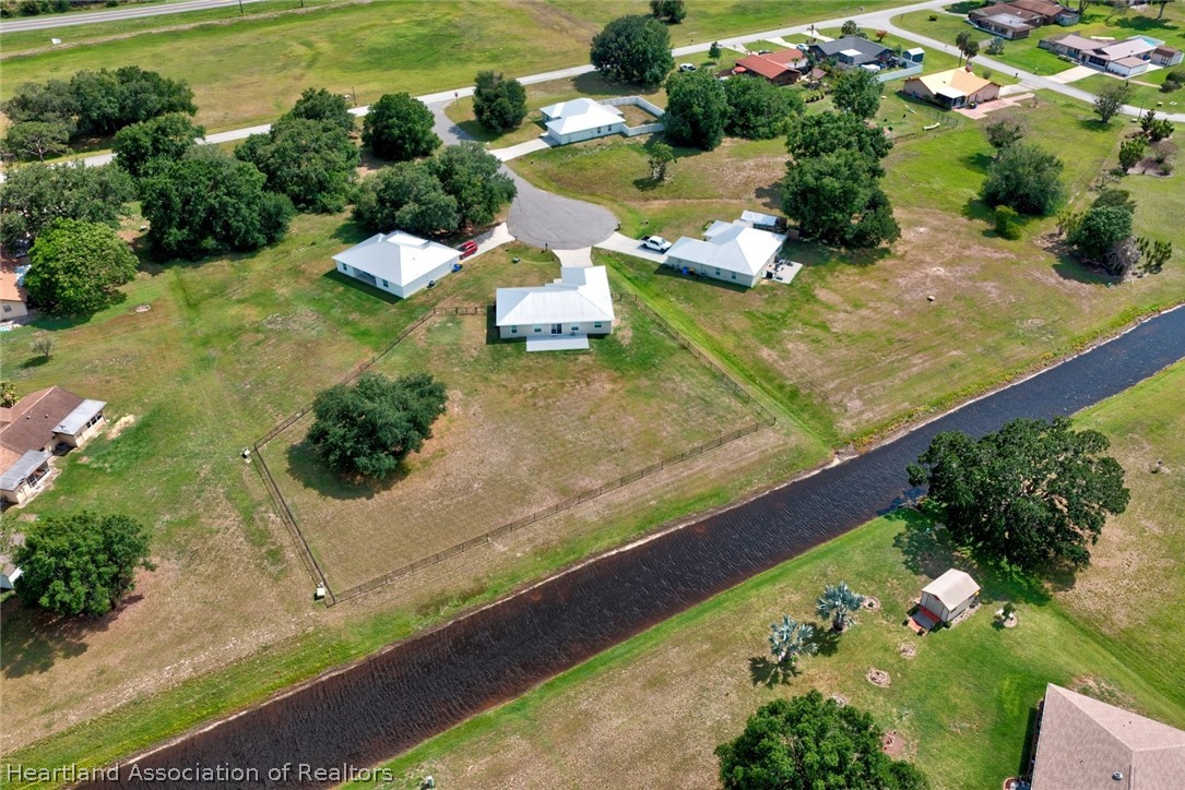 111 Vale Court Sebring, FL 33876 - Photo 37 of 40 an aerial view of a house with a yard