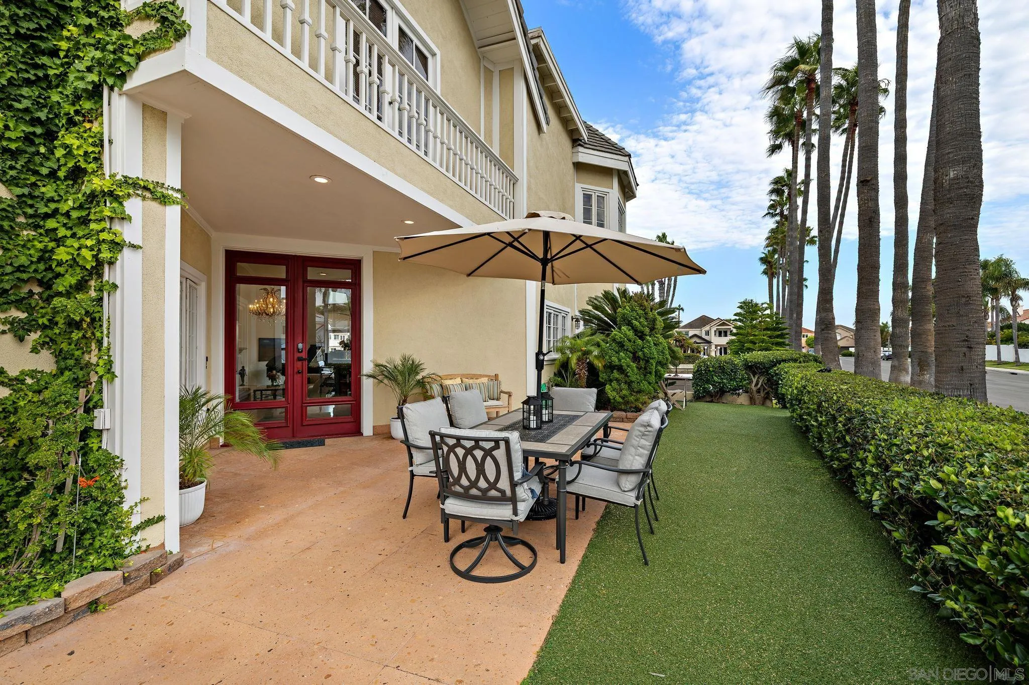 35 Buccaneer Way Coronado, CA 92118 - Photo 16 of 31 a view of a chair and table in the patio in front of a house