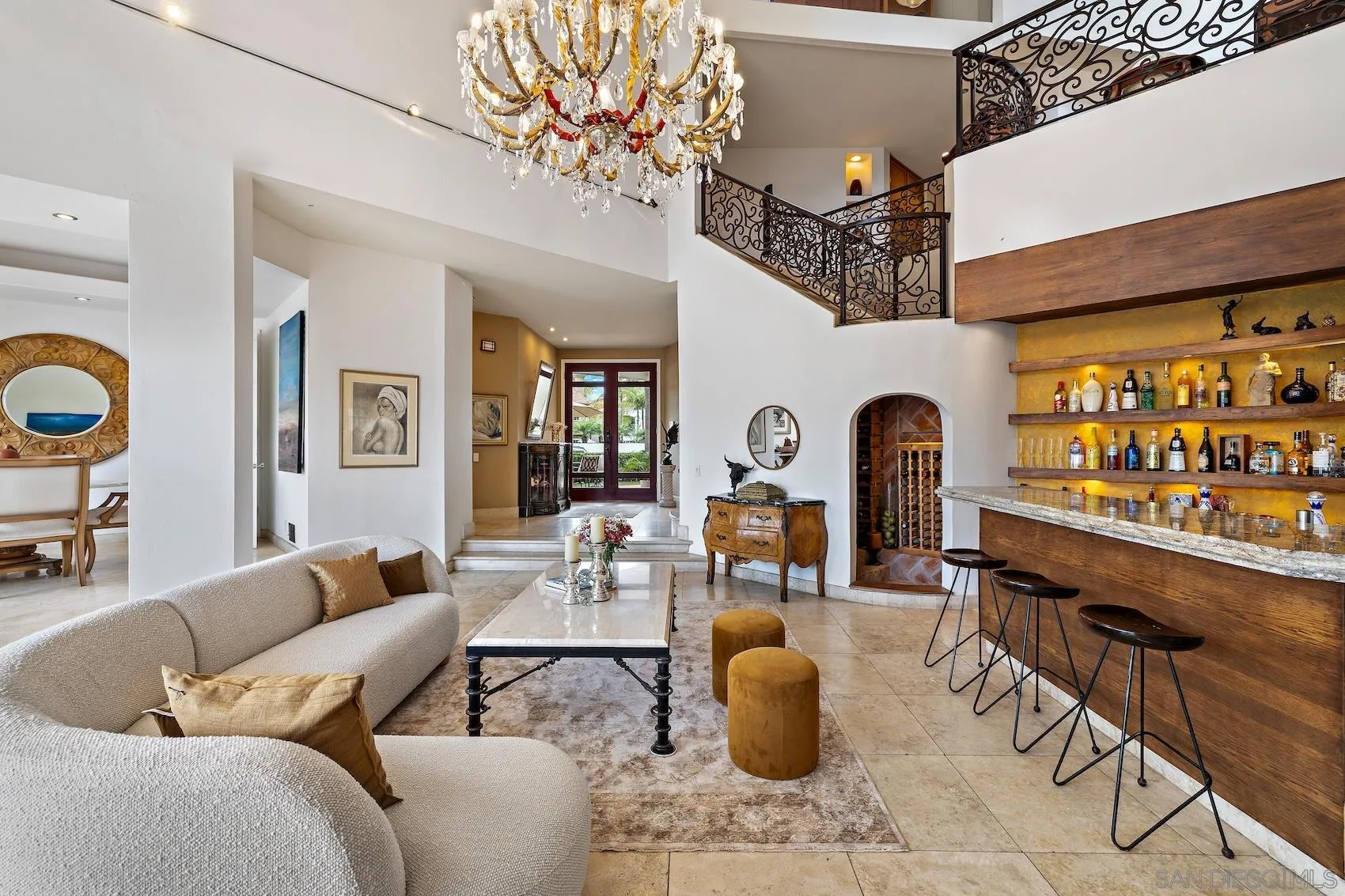35 Buccaneer Way Coronado, CA 92118 - Photo 3 of 31 a living room with furniture a chandelier and a large window