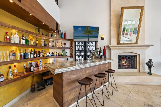 a living room with fireplace furniture and a flat screen tv