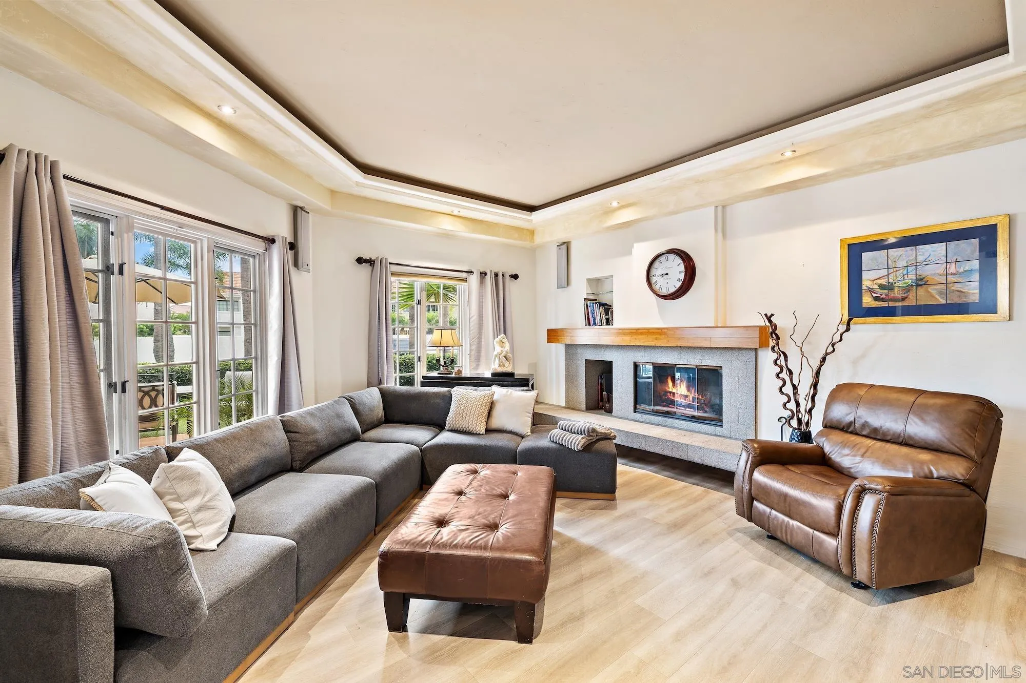 35 Buccaneer Way Coronado, CA 92118 - Photo 7 of 31 a living room with furniture a large window and a fireplace