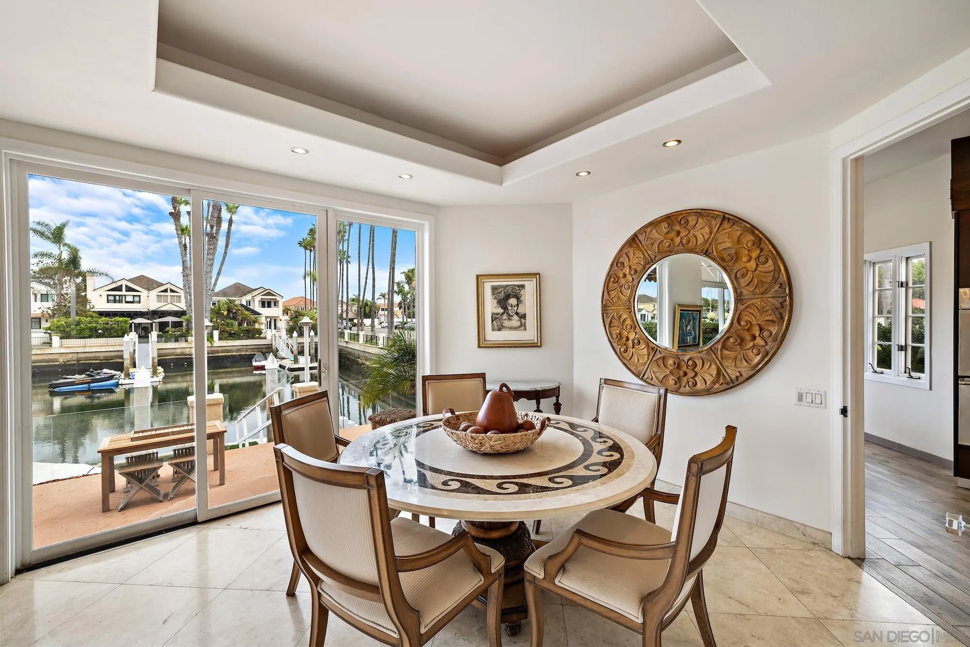 35 Buccaneer Way Coronado, CA 92118 - Photo 9 of 31 a dining room with furniture and a large window