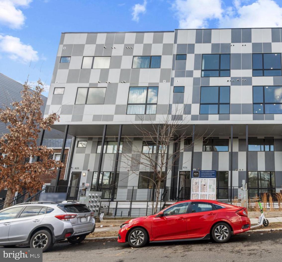 820 18th Street Northeast, Unit 102 Washington, DC 20002 - Photo 1 of 17 a car parked in front of a building