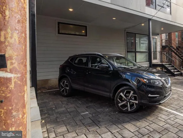 a car parked in front of a building