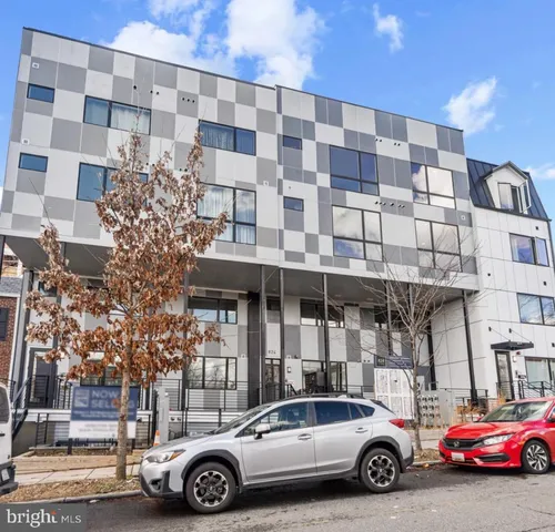 a car parked in front of a building