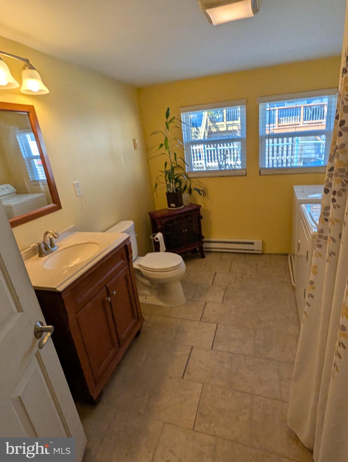 1416 Jackson Street Baltimore, MD 21230 - Photo 5 of 7 a view of a bathroom with a sink