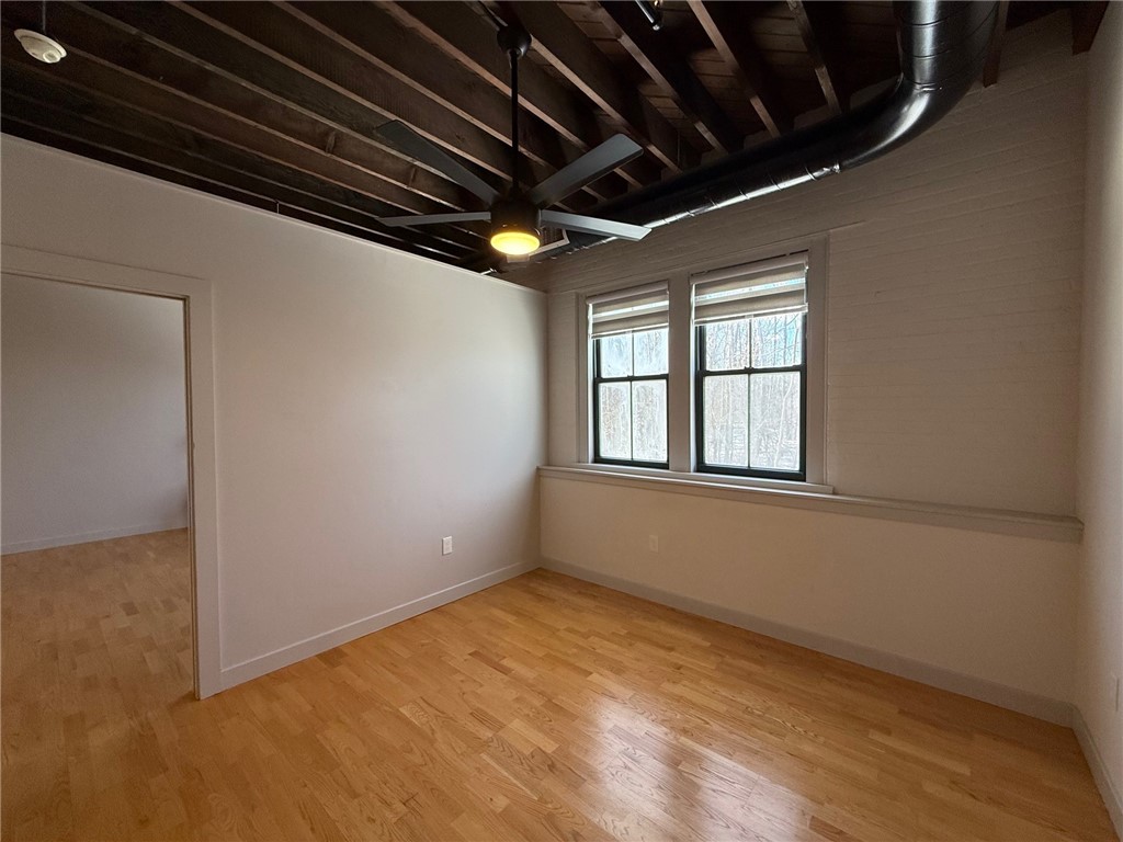 12 Canal Street, Unit 205 Westerly, RI 02891 - Photo 12 of 15 Pocket door and remote control ceiling fan afford privacy when you want to get away. 12 Canal Street #205, Westerly RI 02891