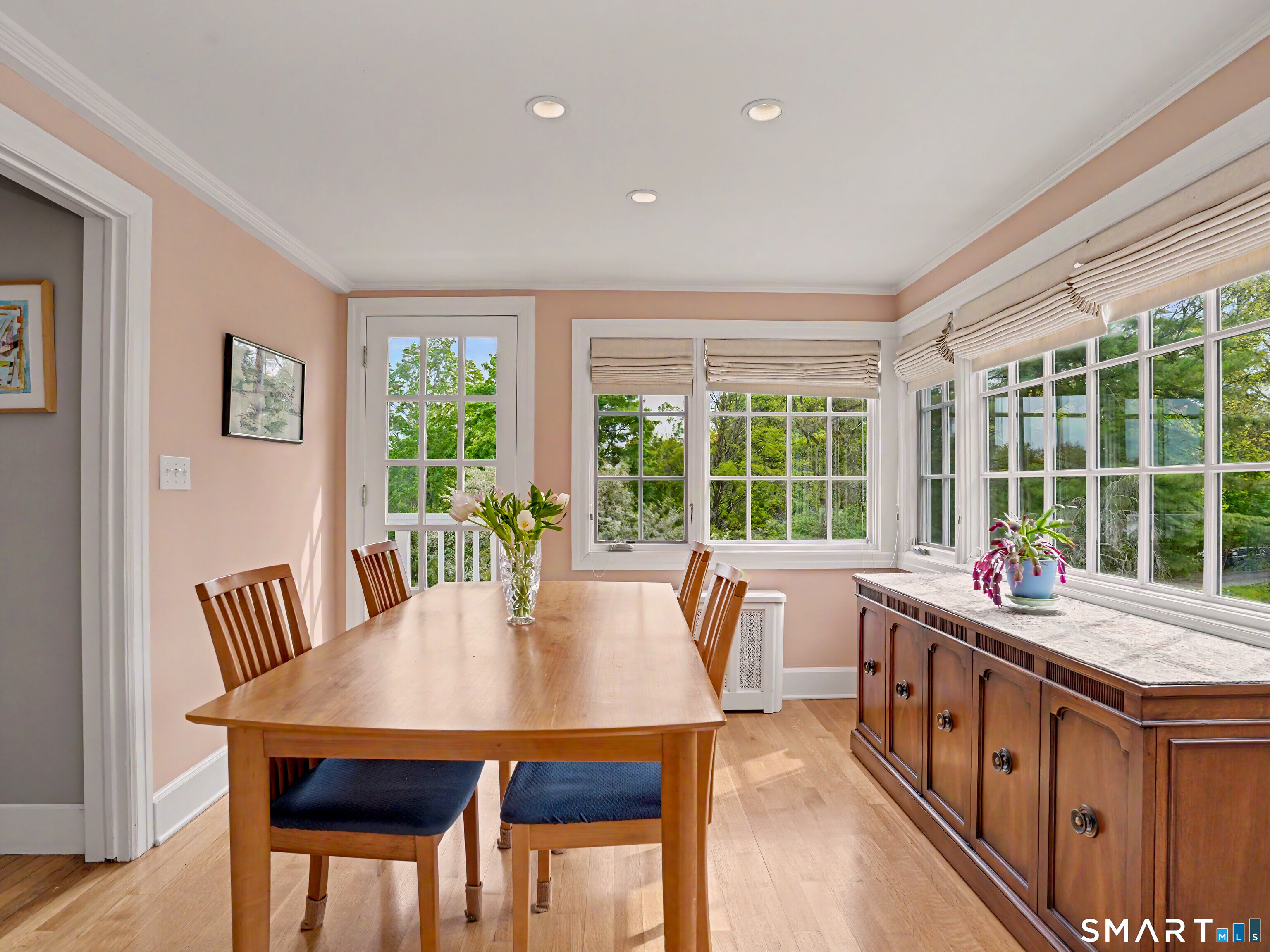 105 Ivy Hill Road Ridgefield, CT 06877 - Photo 15 of 39 The dining room with Marvin windows and it's own exit to the side yard.