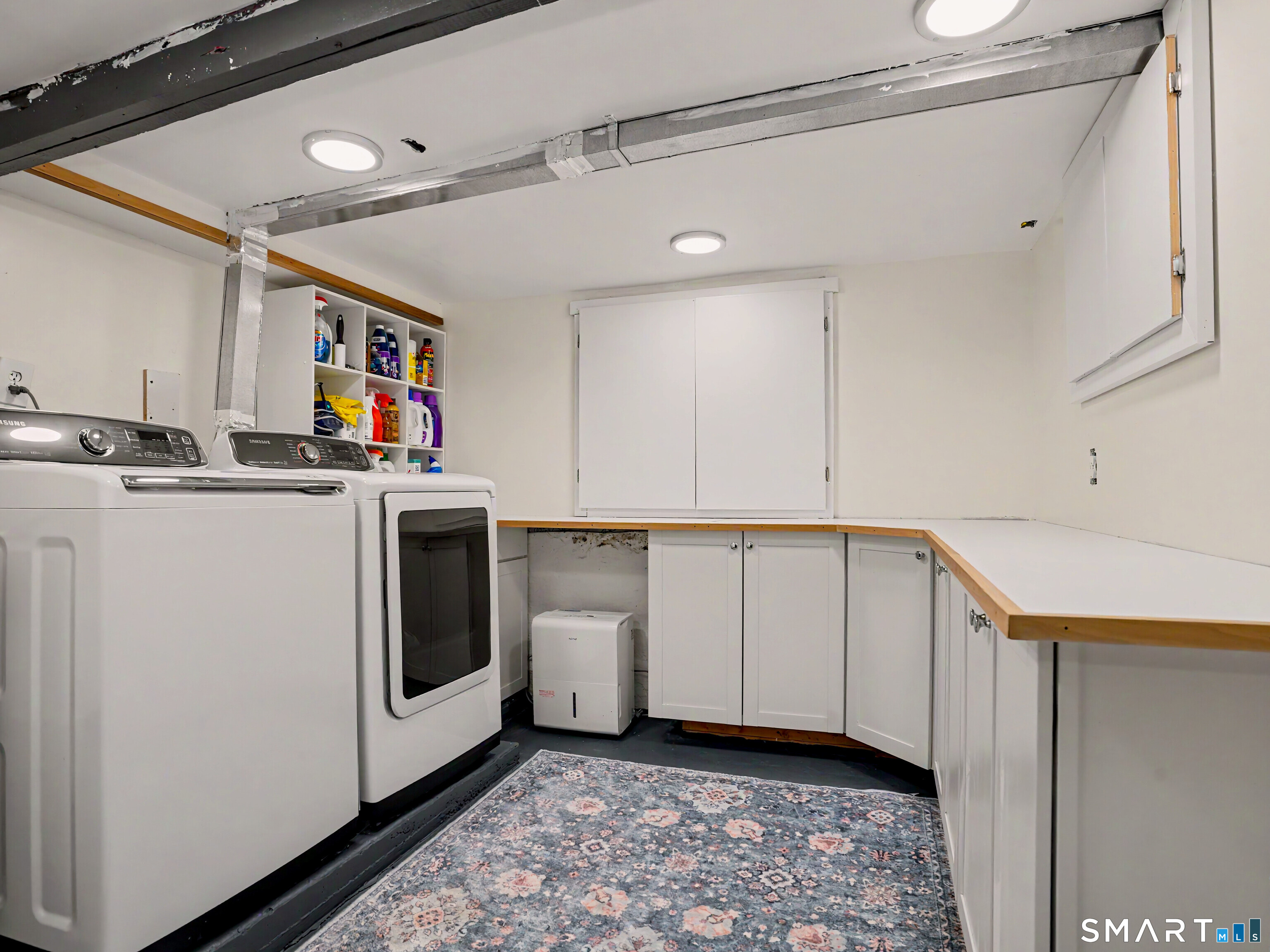 105 Ivy Hill Road Ridgefield, CT 06877 - Photo 36 of 39 The large laundry room offers tons of extra storage.