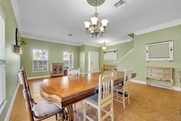 a view of a livingroom with furniture and a window