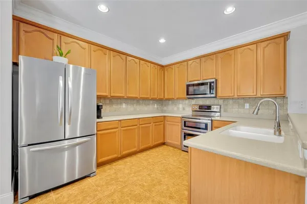 a view of a livingroom with furniture and a window