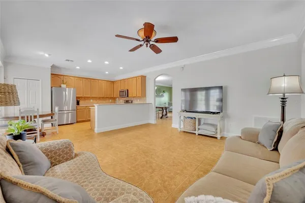 a porch with seating space and hardwood floor