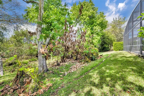 an aerial view of a house with outdoor space