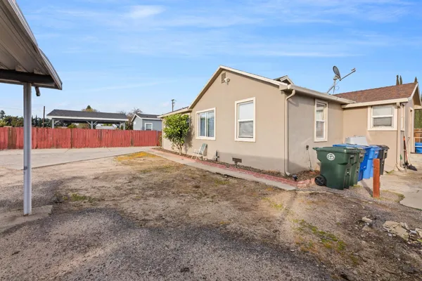 a view of an house with backyard space