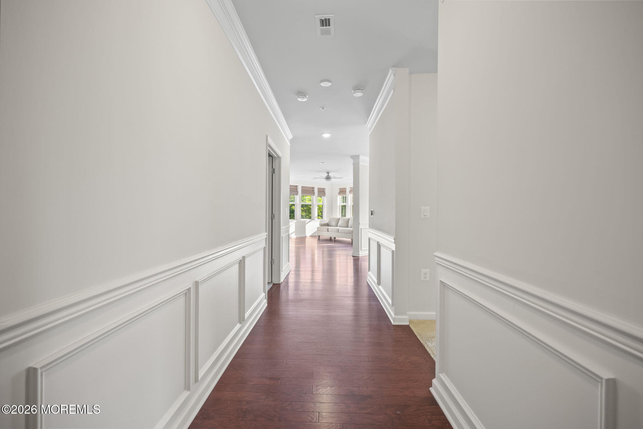 2201 River Road, Unit 4207 Point Pleasant, NJ 08742 - Photo 2 of 34 a view of a hallway with wooden floor