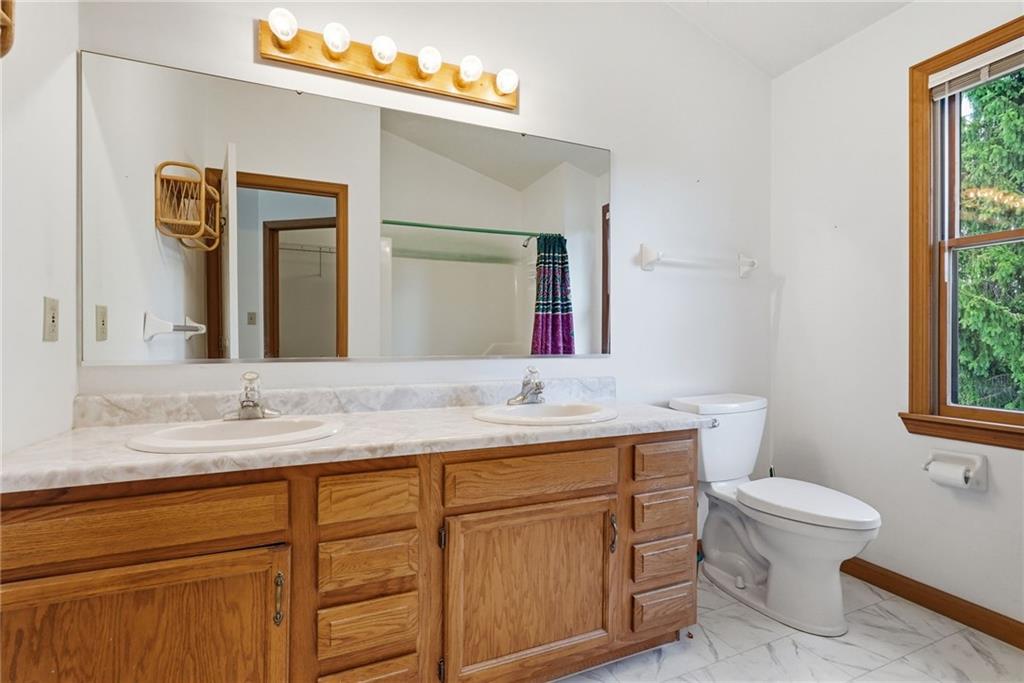 114 Sika Drive Pittsburgh, PA 15239 - Photo 27 of 45 a bathroom with a granite countertop sink vanity mirror and toilet