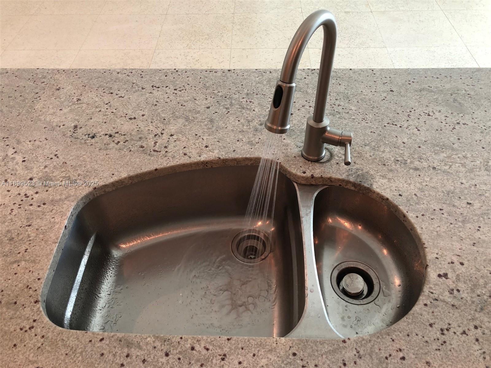 900 Brickell Key Boulevard, Unit 2205 Miami, FL 33131 - Photo 14 of 50 a close view of sink