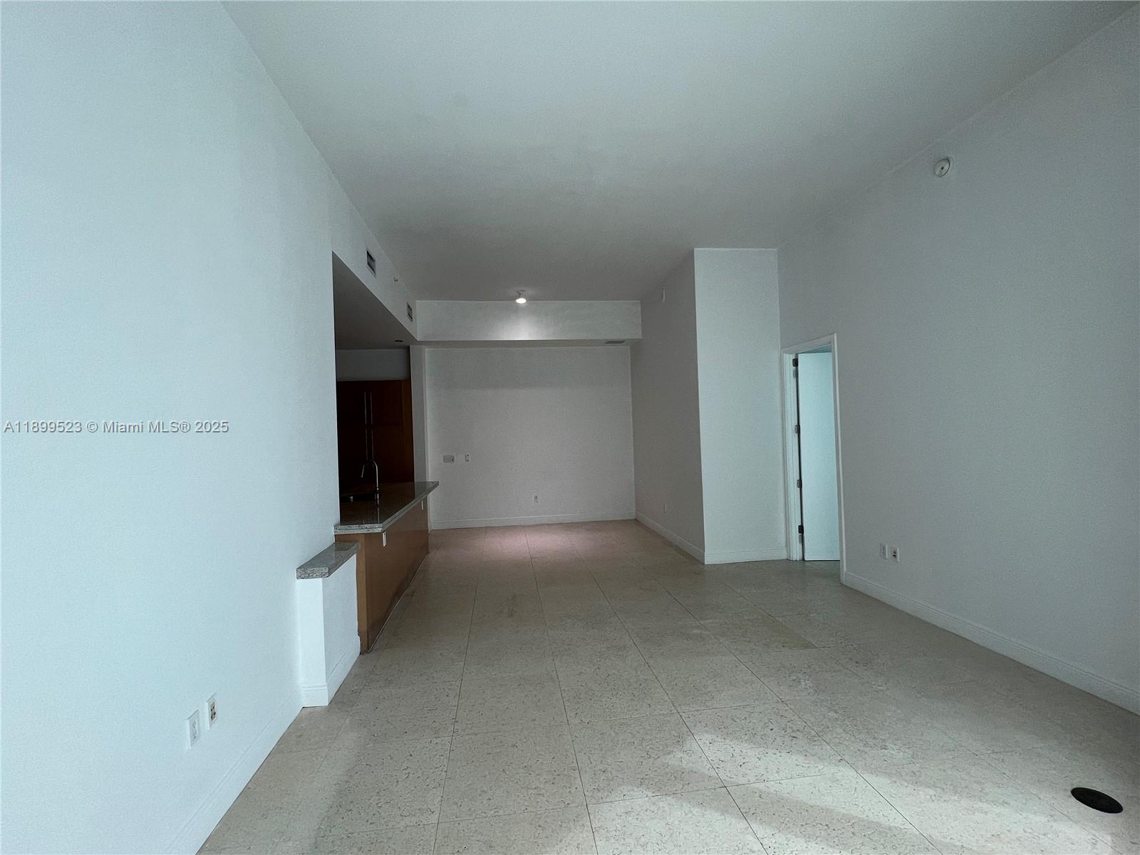 900 Brickell Key Boulevard, Unit 2205 Miami, FL 33131 - Photo 21 of 50 a view of an empty room