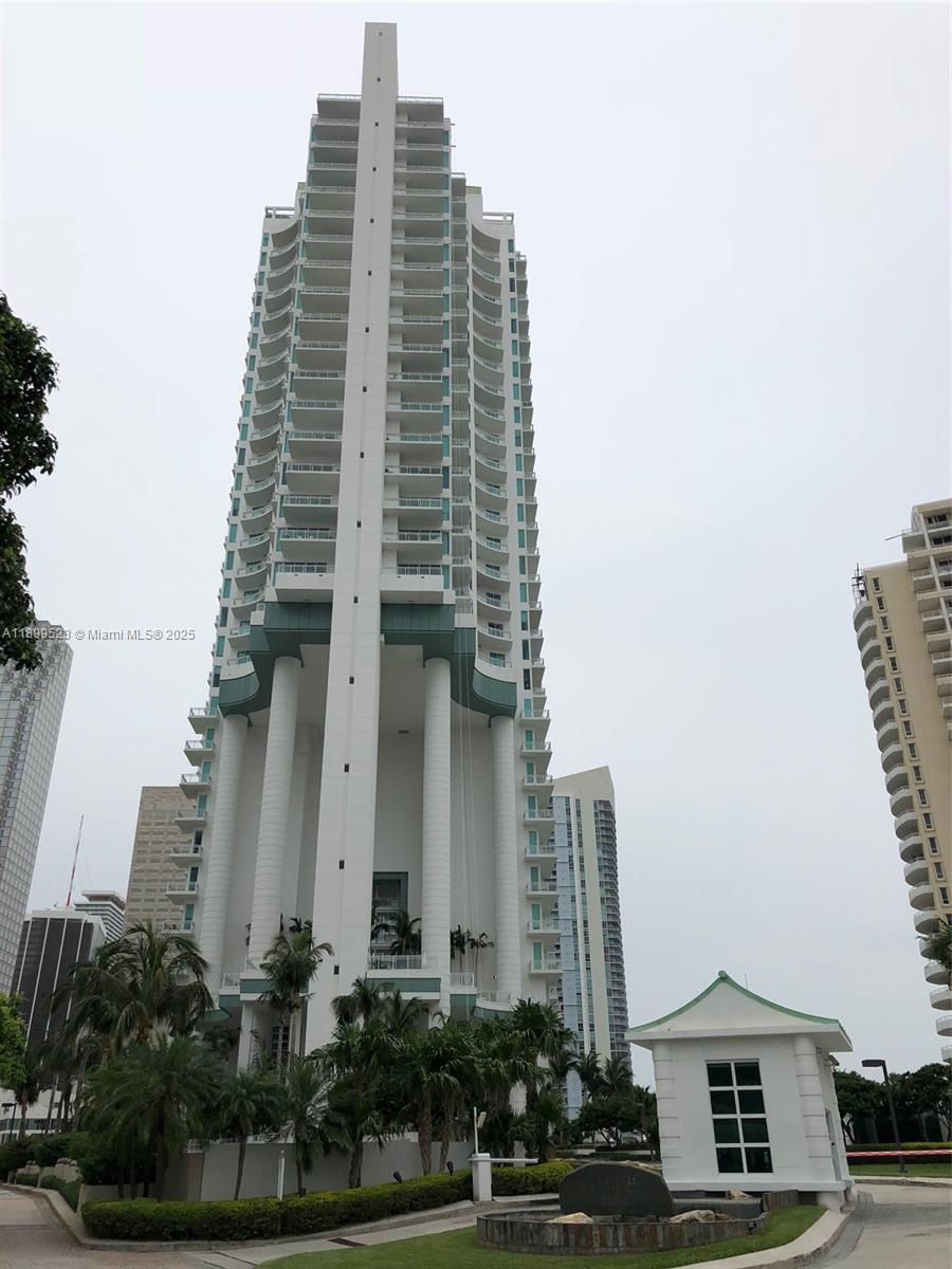 900 Brickell Key Boulevard, Unit 2205 Miami, FL 33131 - Photo 47 of 50 a front view of a multi story building