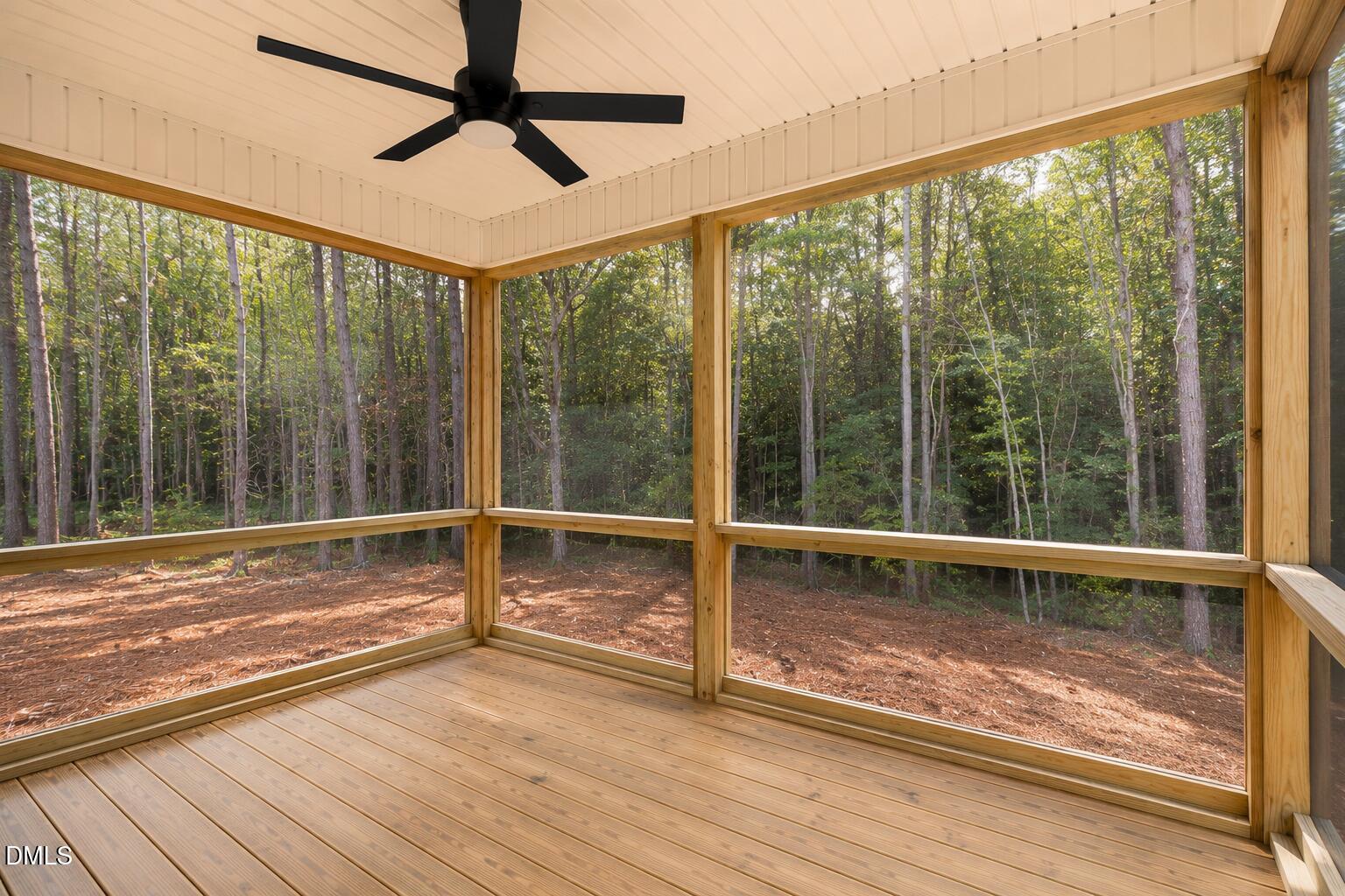 2000 Hayes Road Spring Hope, NC 27882 - Photo 5 of 19 a view of a room with wooden floor and outdoor space
