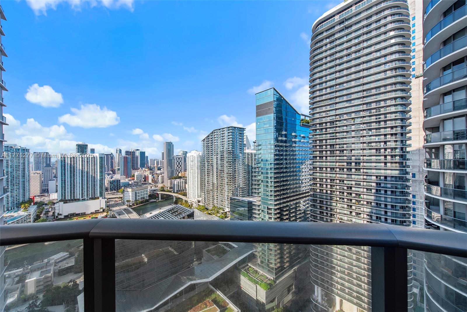 55 Southwest 9th Street, Unit 3601 Miami, FL 33130 - Photo 35 of 38 a view of a balcony with city