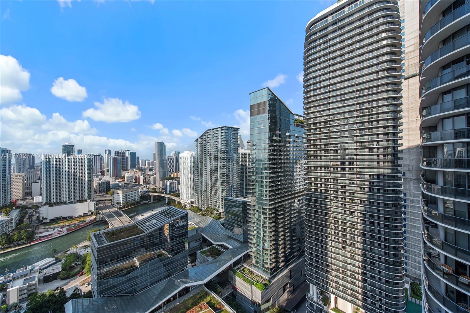 55 Southwest 9th Street, Unit 3601 Miami, FL 33130 - Photo 36 of 38 a view of a city with tall buildings