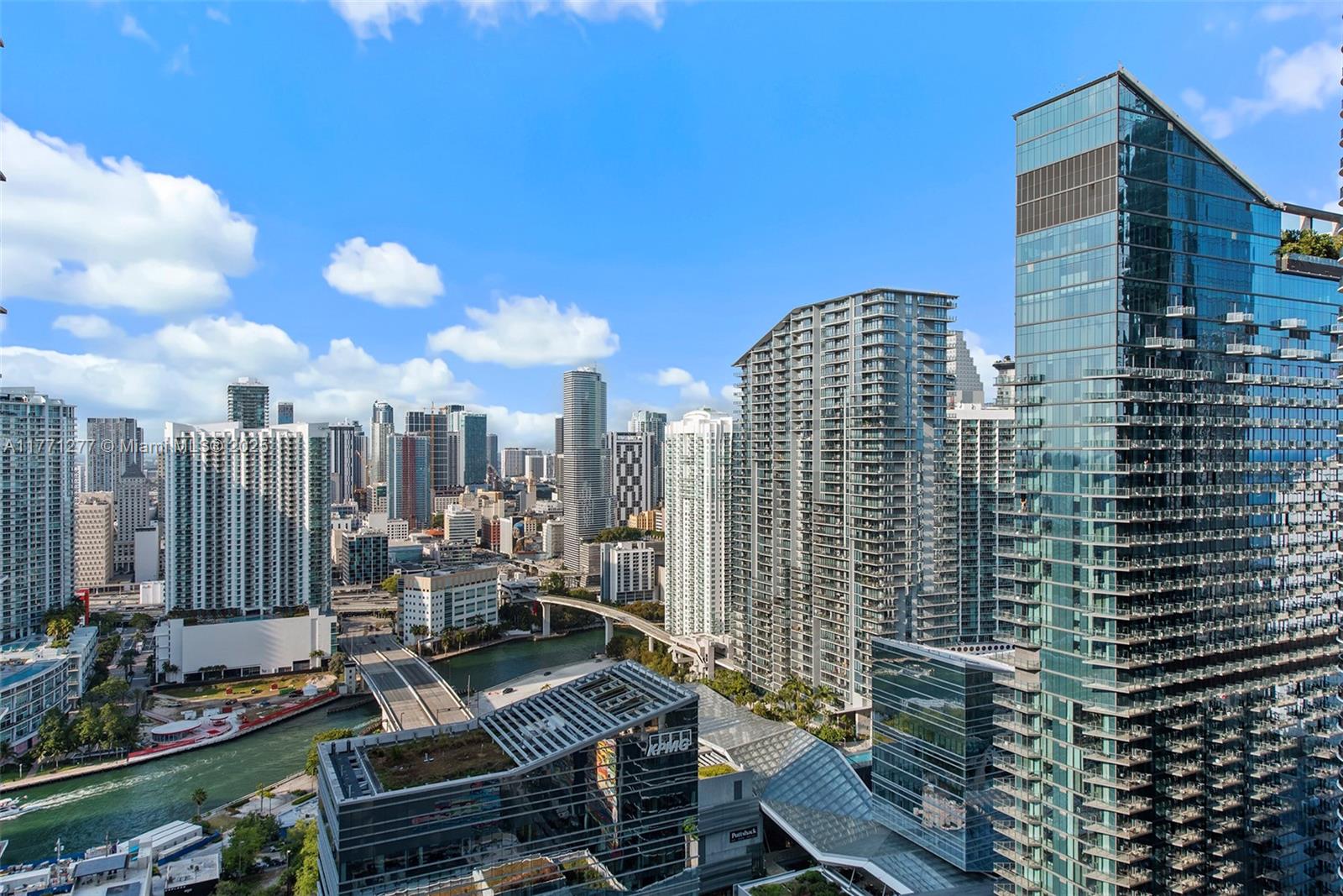 55 Southwest 9th Street, Unit 3601 Miami, FL 33130 - Photo 37 of 38 a view of city with tall buildings