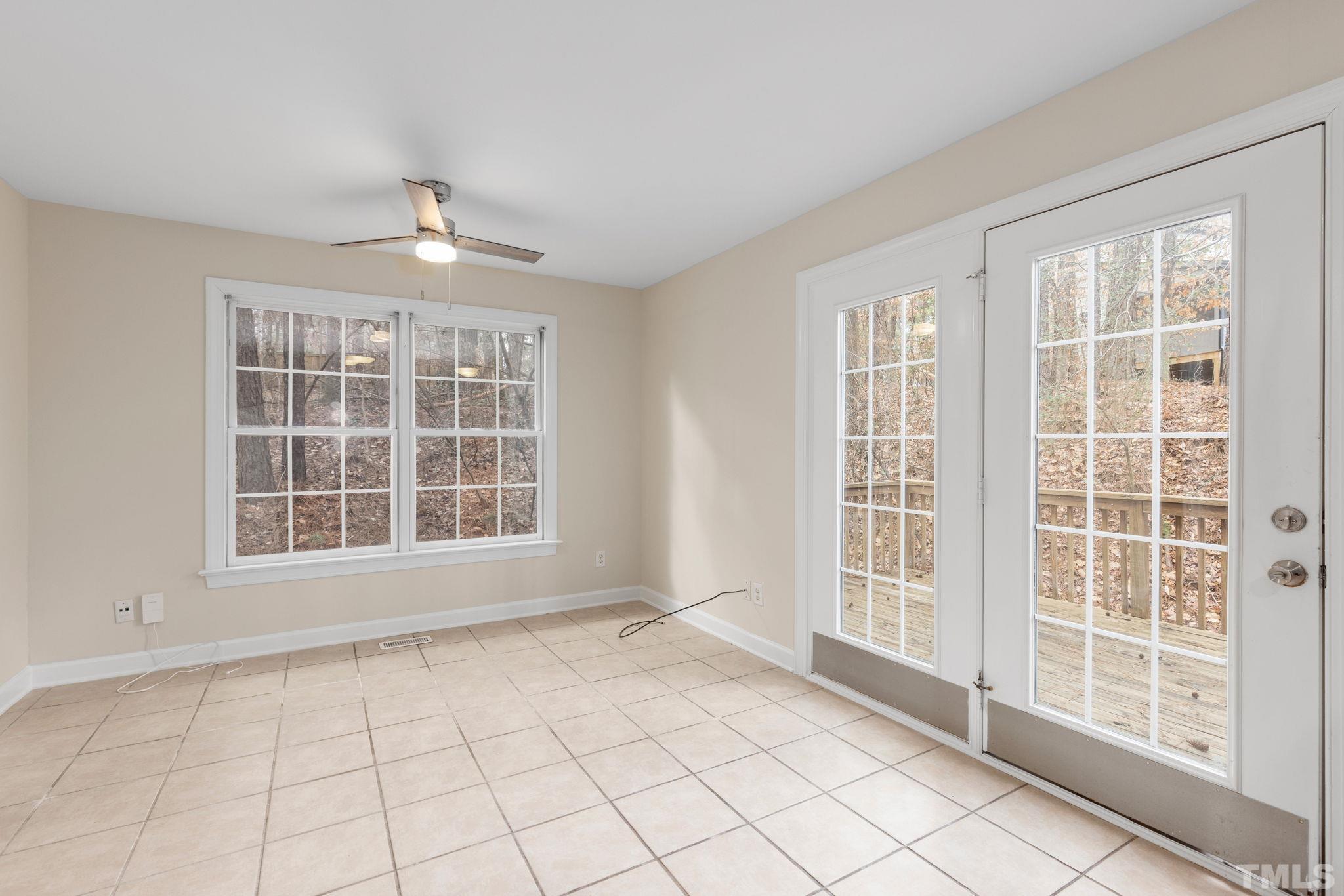 4313 Timberwood Drive Raleigh, NC 27612 - Photo 11 of 28 a view of an empty room with a window
