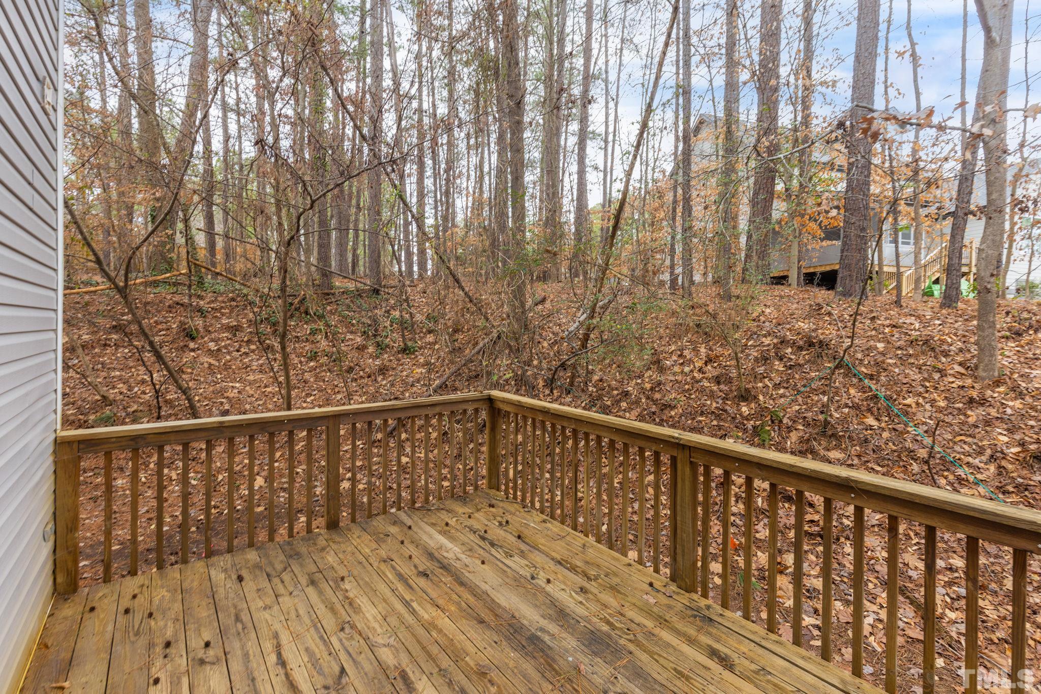 4313 Timberwood Drive Raleigh, NC 27612 - Photo 14 of 28 a view of balcony with wooden floor